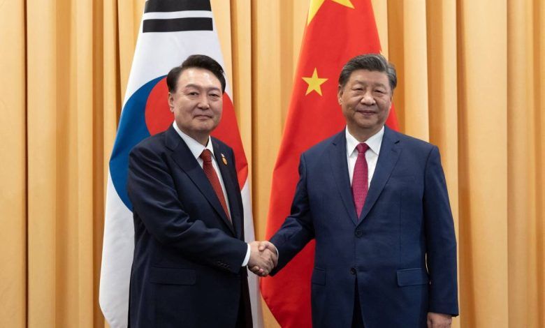 South Korea, China Leaders Hold Rare Meeting, Pledge Cooperation