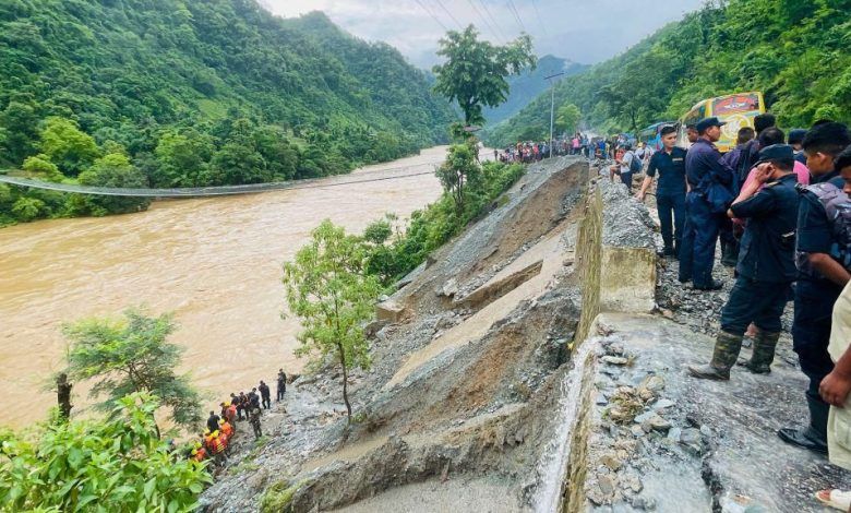 More than 60 people missing after two buses swept into river in Nepal