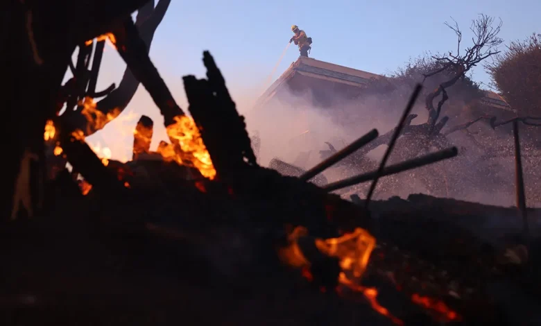 Los Angeles Wildfires Force Evacuations, Destroy Homes