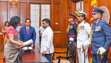 Sri Lanka leader reappoints Amarasuriya as PM, retains finance and defence